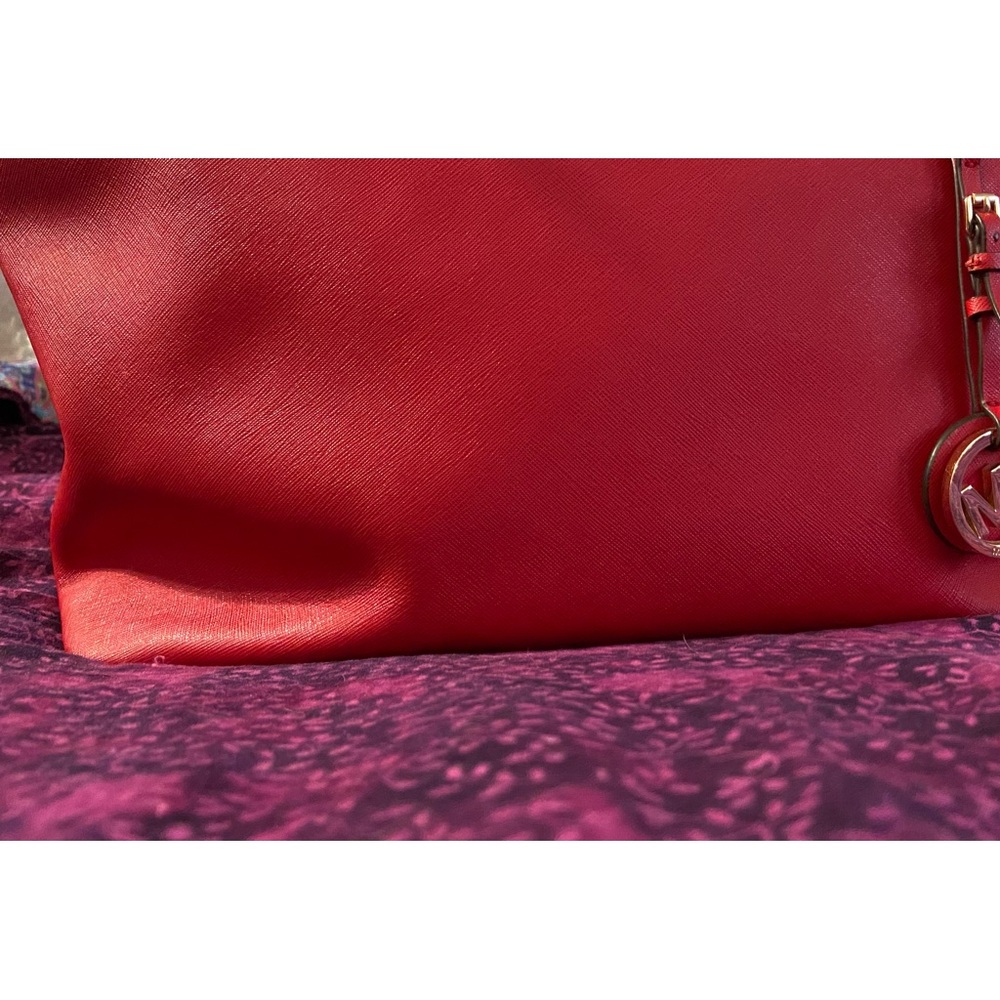 Look!  It’s Clifford, the big, red bag.  Michael Kors